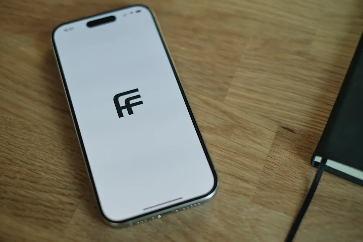 Close-up of a wearable health monitoring device on a person's wrist | Photo by Unsplash