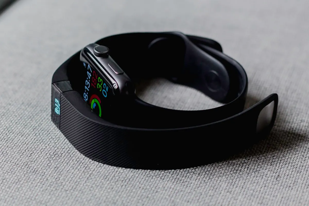 Smartwatch displaying health data on a person's wrist | Photo by Unsplash